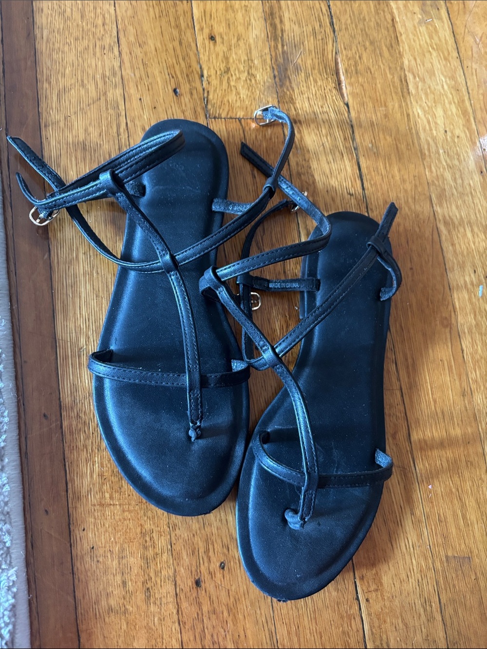 Black strappy flat sandals